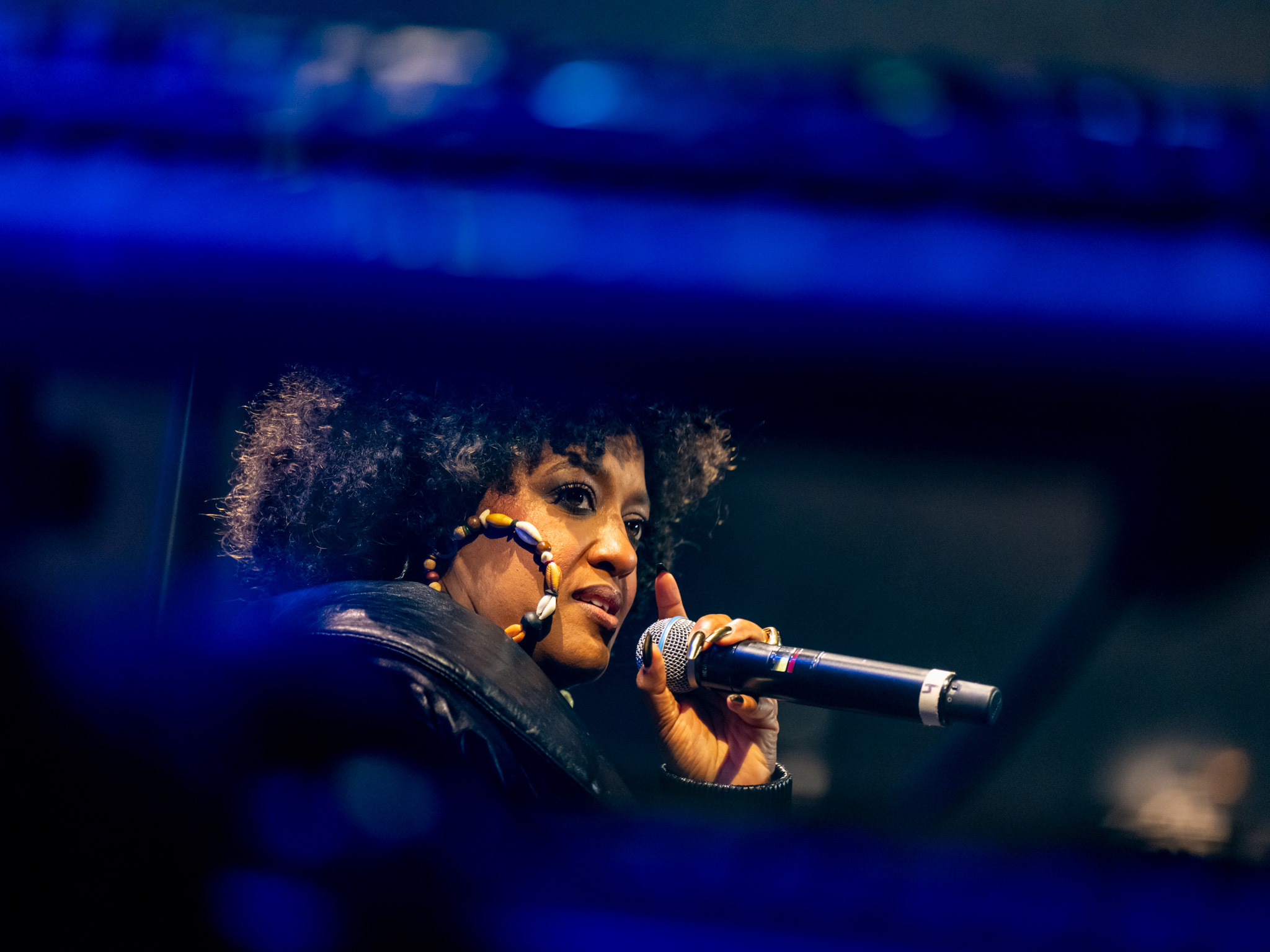 Close-up of Rapsody at the microphone during her Blue Note Los Angeles performance