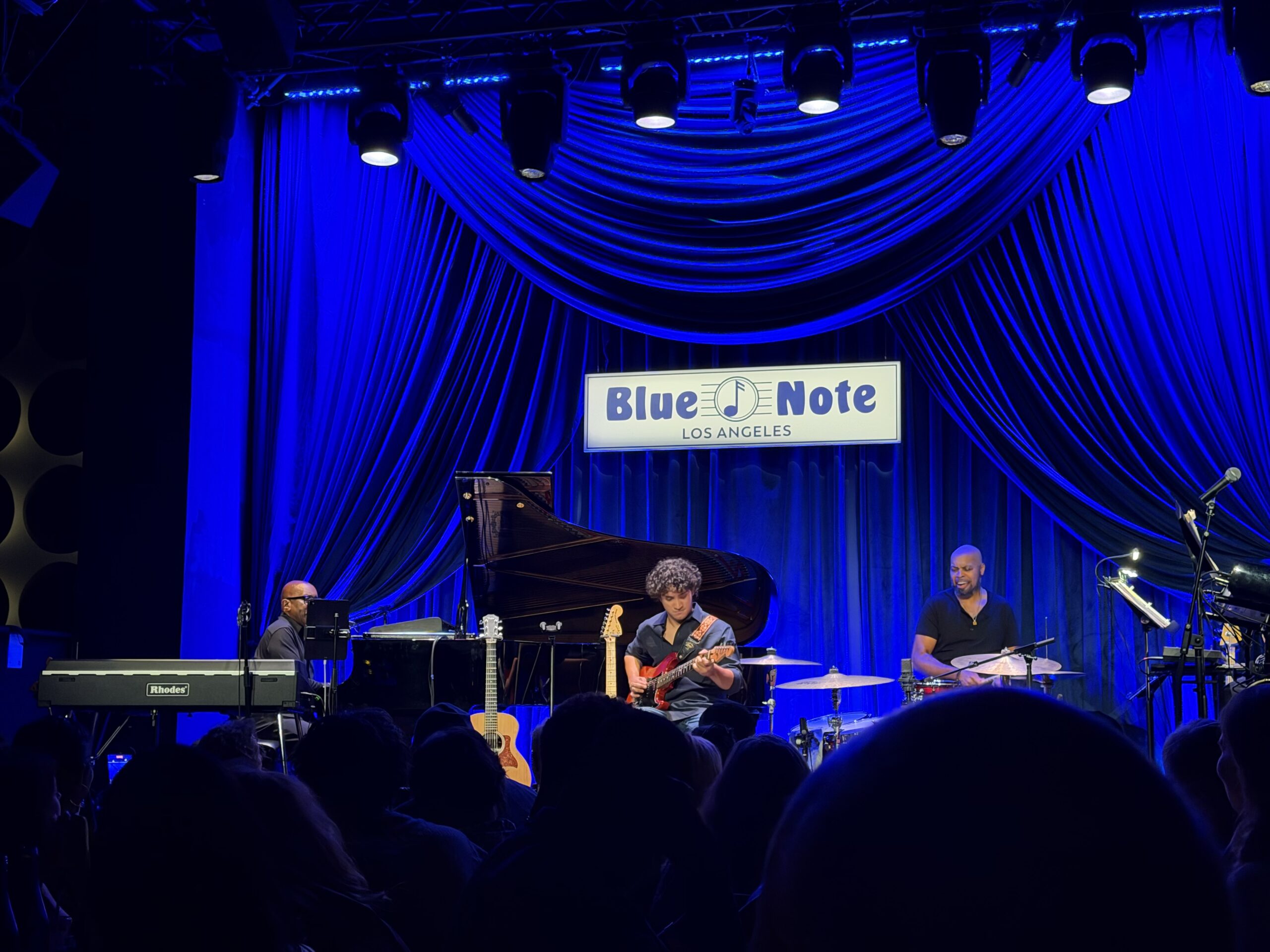 Greg Phillinganes performing at the piano with his band at Blue Note Los Angeles